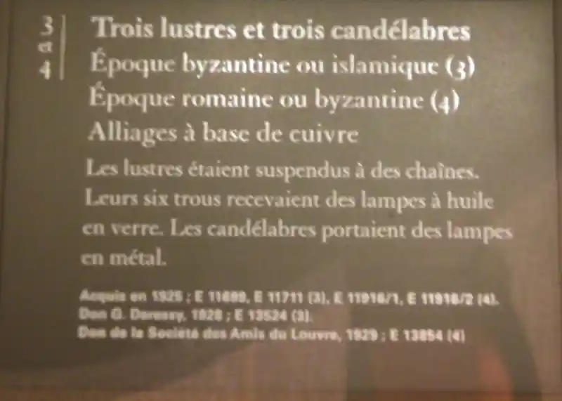 Candelabra with crosses around sun